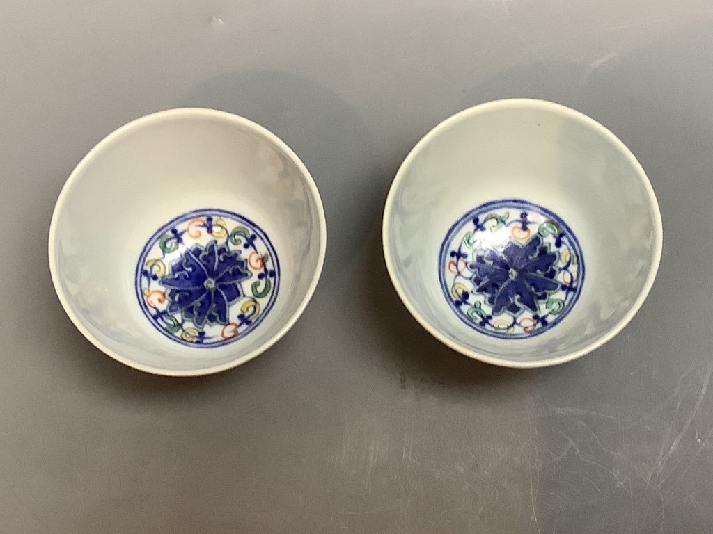 A pair of Chinese doucai cups, height 6cm